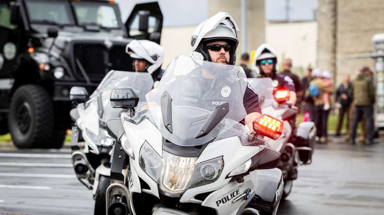 Layton Police Department officers do a demonstration on police motorcycles during the first Find Yourself in Utah Law Enforcement Career Day held outside the Peace Officers Standards and Training Center on Salt Lake Community College’s Miller Campus in Sandy on April 30. Layton Police Department officers do a demonstration on police motorcycles during the first Find Yourself in Utah Law Enforcement Career Day held outside the Peace Officers Standards and Training Center on Salt Lake Community College’s Miller Campus in Sandy on April 30. (Isaac Hale, Deseret News)